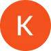 White letter K on red circular background, Memphis Dentures logo icon.