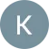 Letter K icon in gray circle, Memphis Dentures branding element