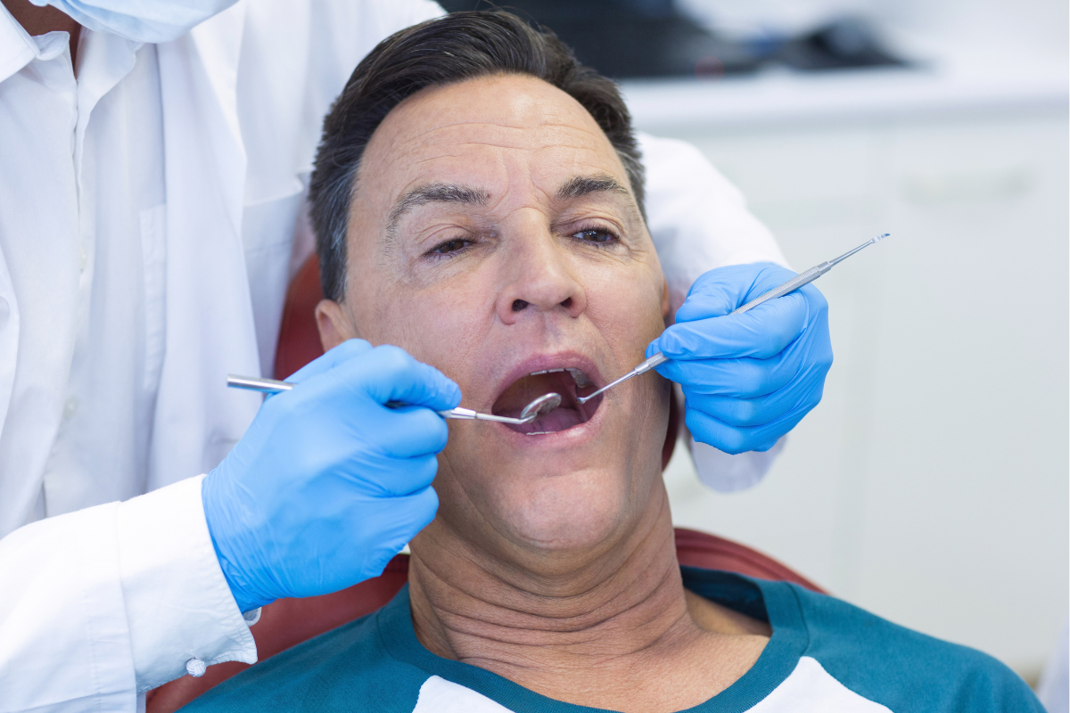 Implants or Dentures? How a Dentist Can Help Choose
